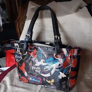 Good Condition Sakroots Coated Canvas